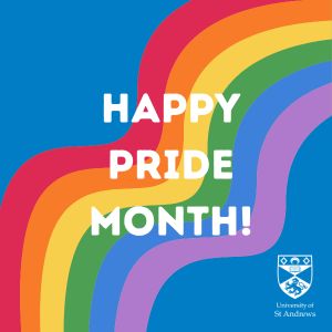 Blue background with a wavy rainbow going across the centre of the image. White text on top reads 'Happy Pride Month!'.